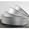 Anodized aluminum cake pan with removable bottom with bevel edge